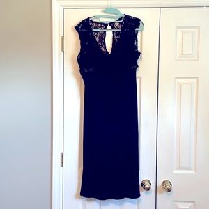 Black below the knees formal dress. See tag for material. Size 12. Gently worn.